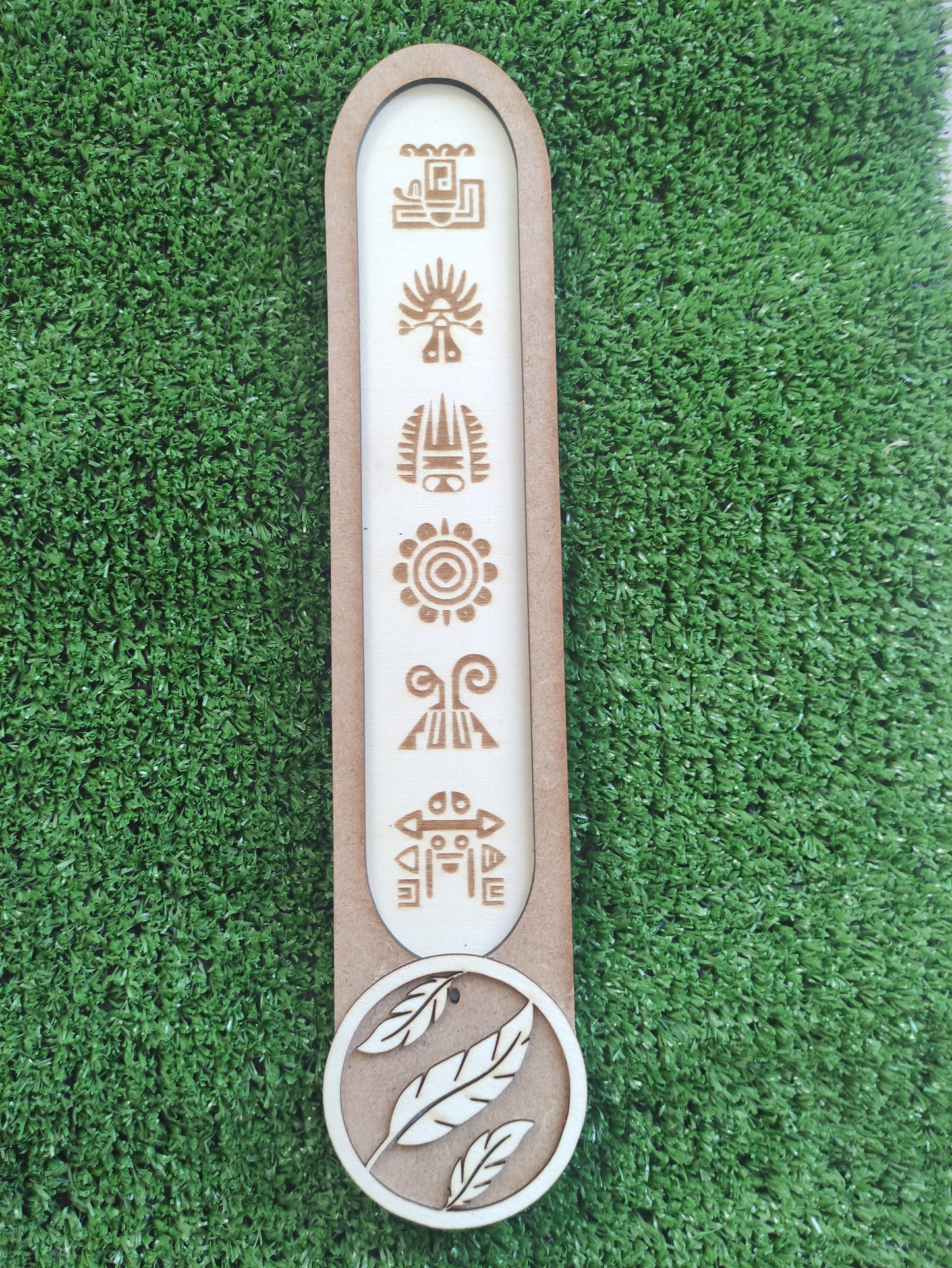 Porta incienso símbolos aztecas y plumas